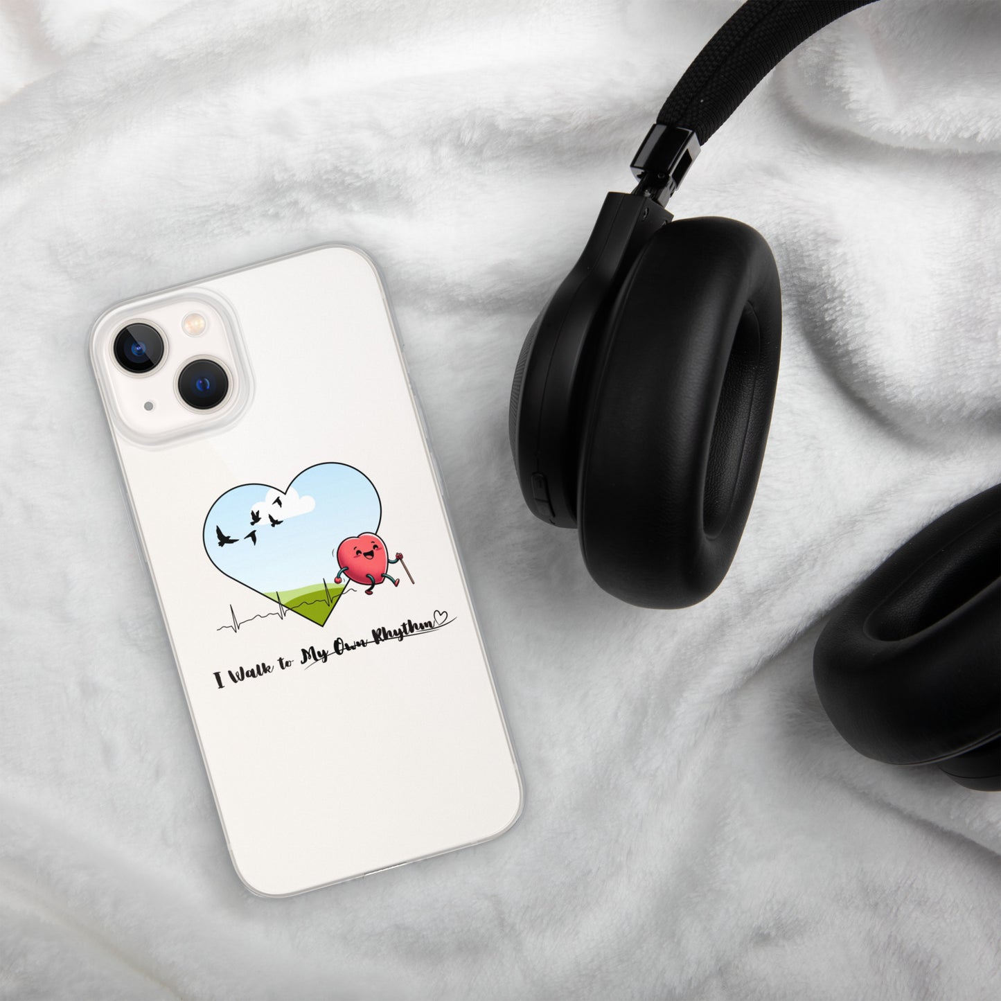 a phone case with a heart on it and headphones