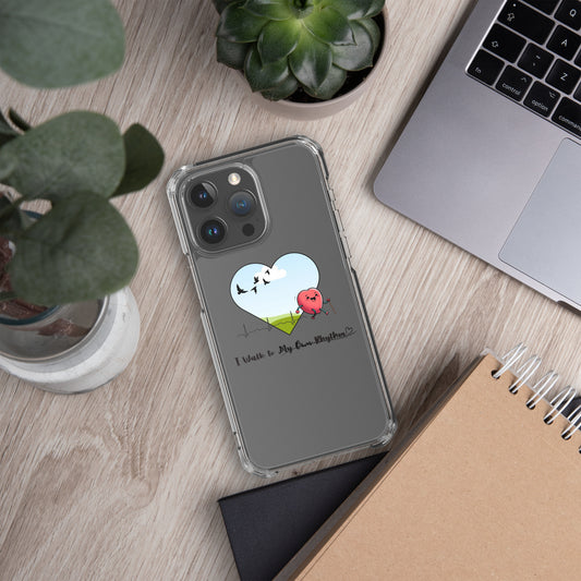 a phone case sitting on top of a desk next to a laptop